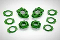 A set of green Rovan RC rear hubs and shims arranged on a white background.