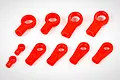 A set of ten red plastic RC ball end rod connectors of varying sizes arranged on a white background.