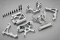A Rovan aluminium front parts kit for RC vehicles, featuring various machined silver metal suspension components and a set of black screws on a grey background.