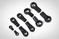 A set of various sizes of black plastic rod ball ends for RC vehicles arranged on a white background.