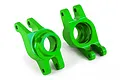 Two bright green anodized aluminum rear stub axle carriers for a Traxxas RC vehicle, shown from a studio perspective.