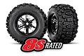 Two Traxxas Sledgehammer RC monster truck tyres mounted on black dual-spoke rims, featuring an 8S RATED graphic overlay.