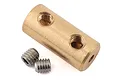 A brass cylindrical motor coupler for an RC boat with two threaded holes and two accompanying steel grub screws.