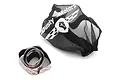 A black Dusty Motors protective mesh cover for RC cars alongside a roll of adhesive Velcro tape on a white background.