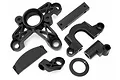 A set of black plastic RC car parts including a large gear mount, engine mount, and various brackets for HPI Baja models.