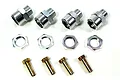 A set of four silver aluminium wheel hex extensions, four silver locking nuts, and four brass pins on a white background.