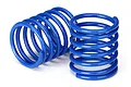 Two blue Traxxas shock springs for RC cars, shown against a plain white background.