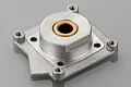 A silver-coloured HSP aluminium rear engine housing for RC cars, featuring a central brass bushing and four mounting points.