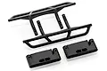 A set of black plastic RC car nerf bars and mounting brackets on a white background.