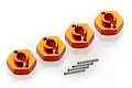 Four orange anodized aluminium 12mm RC wheel hex adapters arranged in a row with four small metal drive pins on a white background.