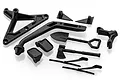 A set of black plastic scale RC accessories including a snorkel, shovel, axe, side mirrors, windshield wipers, and mounting brackets on a white background.