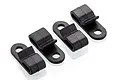 Four black plastic wire clips for RC cars arranged in a row on a white background.