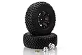 Two black RC crawler tires mounted on black beadlock rims, with two silver wheel hubs and small screws placed in front on a white background.