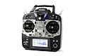 Futaba 10J 10-channel RC transmitter with a black body, chrome faceplate, and illuminated LCD screen, viewed from the front.