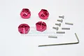 A set of four red anodized aluminium 12mm wheel hex adapters for Traxxas Slash 4x4, including screws, axle pins, and an L-shaped hex key.