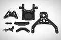 A Rovan front bulkhead set including a black aluminium upper plate, various plastic bulkhead components, and mounting hardware on a white background.