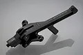 A black GPM Racing aluminium front chassis brace for an RC car, shown from an angled perspective against a grey background.