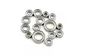A collection of 15 various sized steel ball bearings for RC vehicles arranged on a white background.