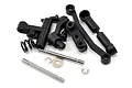 A collection of black plastic steering bellcrank components, metal pins, screws, and small washers for a LaTrax RC vehicle.