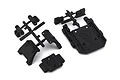 Black plastic RC car parts including a gearbox mount and servo mounting components on a white background.