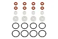 A set of RC shock rebuild components including orange o-rings, white plastic spacers, and black rubber o-rings arranged in rows on a white background.