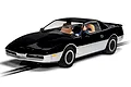 Scalextric 1/32 scale Knight Rider K.A.R.R. slot car in black and silver, positioned on a slot car track against a white background.