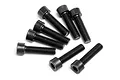 A group of eight black metal cap head screws with fine threading arranged on a white background.