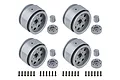 Four sets of silver 1.9-inch RC crawler rims with hex hubs, caps, and mounting screws on a white background.