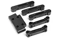 A set of black plastic suspension arm pin mounts for HPI RC vehicles, including various mounting blocks and brackets.