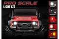 Front view of a red Traxxas TRX-4M Land Rover Defender RC car with active LED headlights, alongside smaller inset images showing various lighting modes.