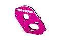 A pink anodized aluminium motor plate for Traxxas RC vehicles, featuring the Traxxas logo printed in white.