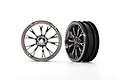 Two Traxxas 2.2 inch Weld black chrome front drag racing wheels for RC cars, shown from front and side angles against a white background.