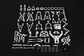 A complete silver aluminium suspension and steering upgrade kit for Rovan Baja RC cars, laid out on a black background.