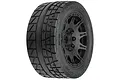 Pro-Line Menace HP belted monster truck tyre pre-mounted on a black Raid wheel, viewed from a three-quarter angle.