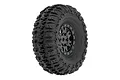 A single Pro-Line 1.0 inch Trencher tyre mounted on a black Impulse bead-loc rim, shown against a white background.