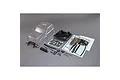 Axial 1/6 scale Honcho clear unpainted RC body shell kit including interior, decals, and various plastic trim parts on a grey background.