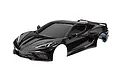 A black Traxxas 1/10 scale Chevrolet Corvette Stingray RC car body shell on a white background.