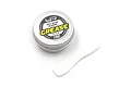 A small round metal tin of Yeah Racing Anti-Wear Bearing Grease with a white plastic spatula on a white background.