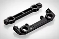 Two black plastic RGT RC body mount components shown from a high angle against a white background.