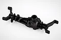 A black plastic RGT front differential axle housing for an RC car, shown from a high-angle studio perspective.