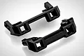 Two black plastic RGT bumper mounts for RC cars, shown from an angled perspective against a white background.