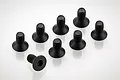 Eight black metal countersunk head screws with hex drive, arranged on a white background.