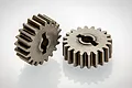 Two RGT 20T metal transmission gears for RC vehicles shown against a white background.