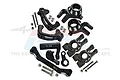 A set of black anodized aluminium RC steering and hub components by GPM Racing, including steering knuckles, hubs, and hardware on a white background.