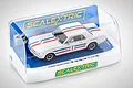 A 1/32 scale Scalextric Ford Mustang slot car in white with red and blue racing stripes, displayed in its original clear plastic packaging.