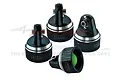 Four black aluminium shock caps by GPM Racing for RC cars, featuring a metallic finish and engraved branding.