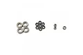 A collection of various sized metal ball bearings arranged in groups on a plain white background.