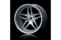 A silver five-spoke RC car rim with a deep dish design against a black background.