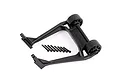A black Traxxas Sledge wheelie bar assembly with two wheels and a set of mounting screws on a white background.