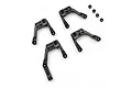 A set of four black aluminium shock mounts for RC cars by Yeah Racing, featuring machined details and small spacers on a white background.